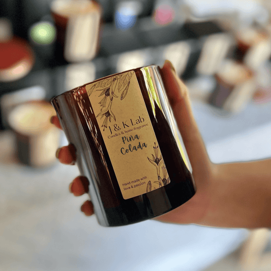 J&K Lab Pina Colada soy candle with pineapple slices and coconut flakes from Melbourne