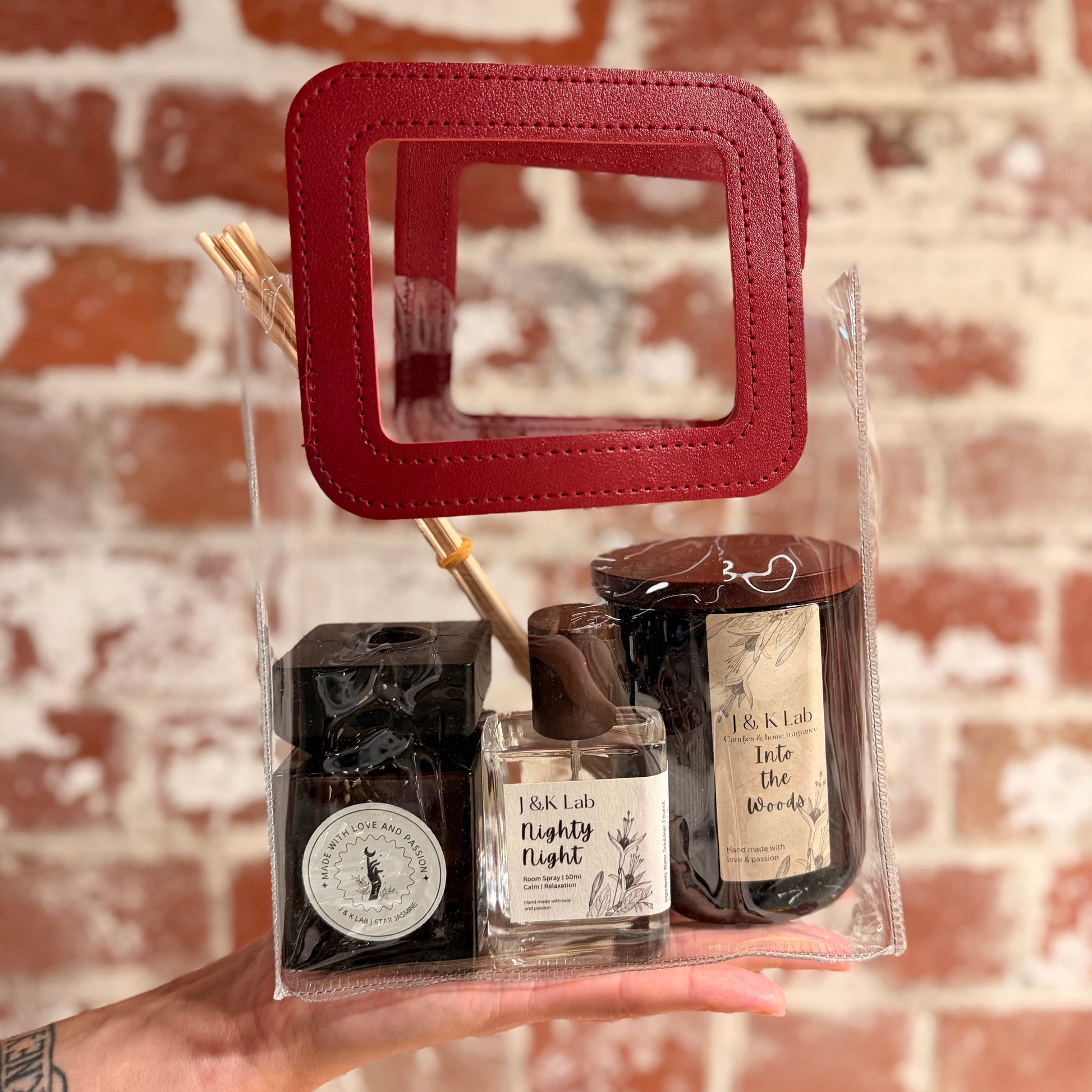 A star Jasmine Reed diffuser, into the woods candle and a nighty night room spray 