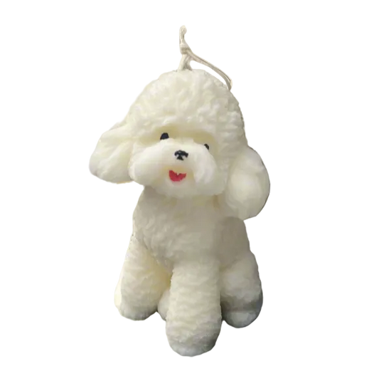 A white poodle-shaped pillar candle with a smiling face